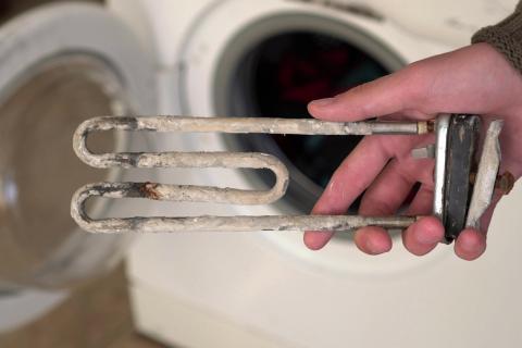 Dépôt de tarte sur une résistance de lave-linge